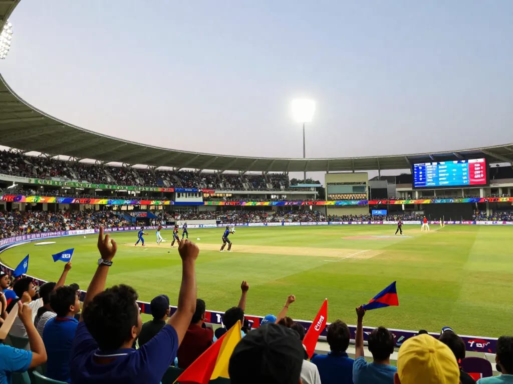 Excited fans and players in action at a T20 World Cup match, highlighting cricket exchange online.